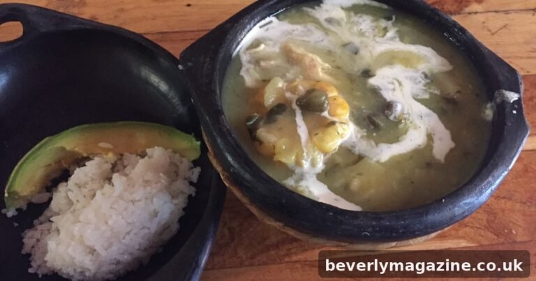 Bowl of ajiaco soup with corn, cream and capers in a clay bowl