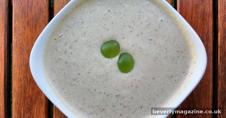 Best Ajo Blanco Near Me: Where to Find Spain’s White Gazpacho Bowl of chilled ajo blanco almond soup topped with green grapes and olive oil